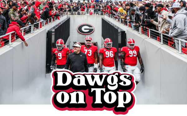 Dawgs on Top banner with Kirby and players